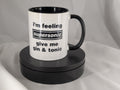 White mug with black interior and handle, featuring text on a gray background