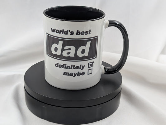 White mug with black interior and handle, featuring text on a white background