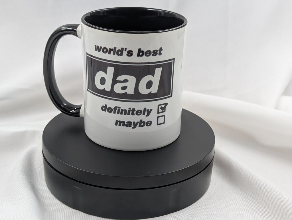 Mug with 'world's best dad definitely maybe' text on a white background